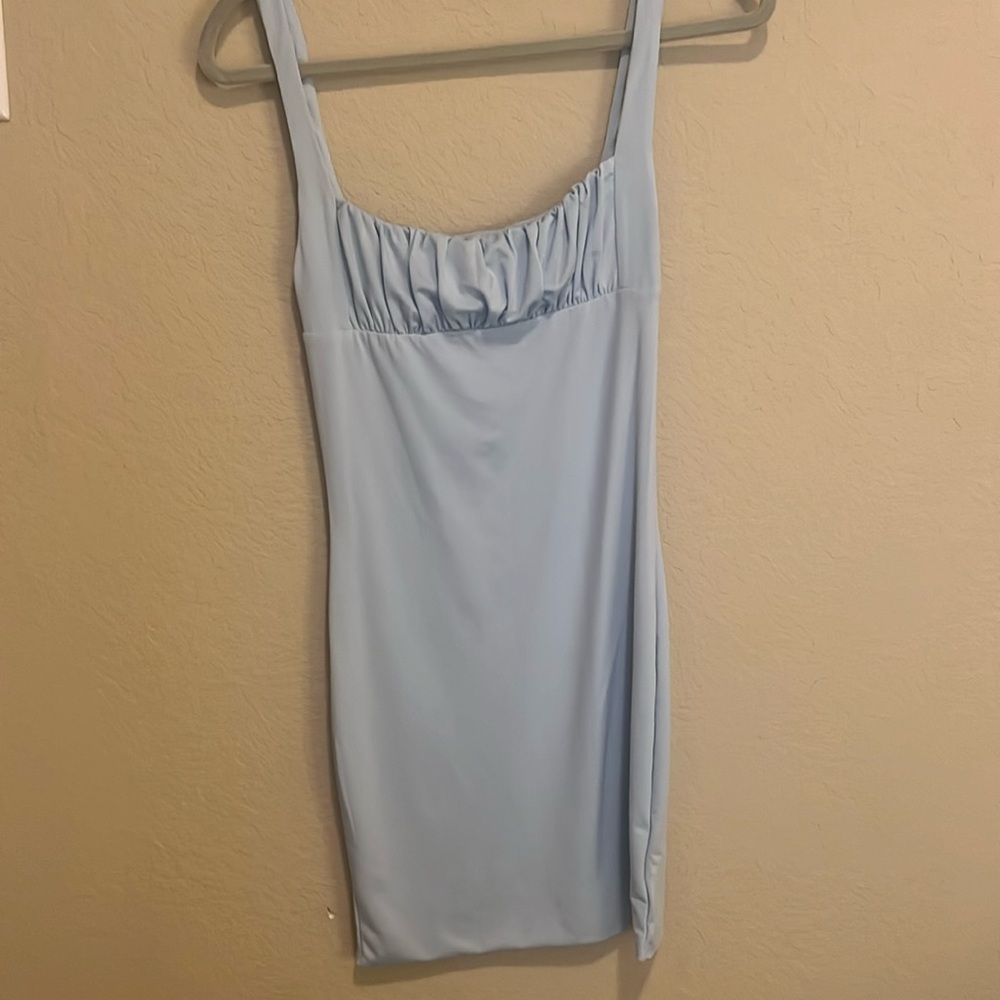 Light baby blue dress no sizes on it but fits s/m